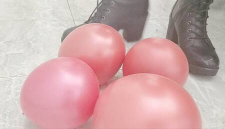 Stomping on red balloons in boots with thick heel