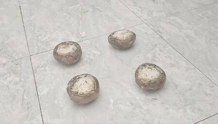 Stomping on stuffed mushrooms in black heels