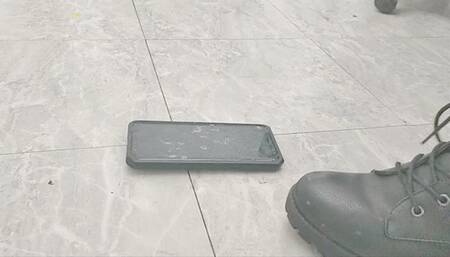 stomping on cellphone with boots with thick heel