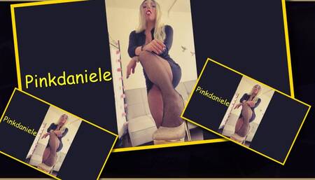 Sexy smoker in fishnets and high heels