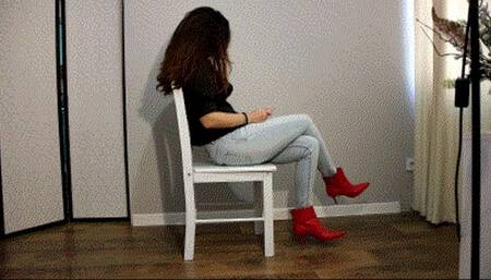 Toe tapping in leather red ankle boots