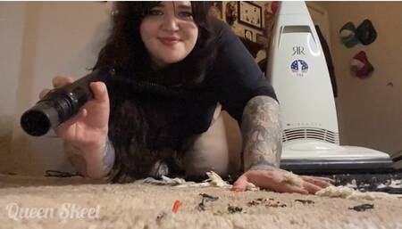 Giantess vacuums up tiny disobedient people