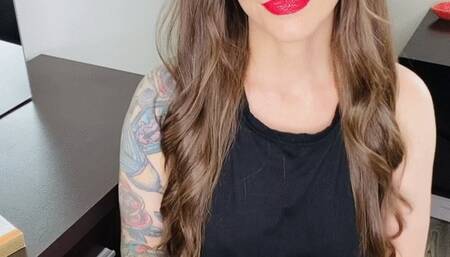 Smoking Wearing Black Jeans and Tank Top