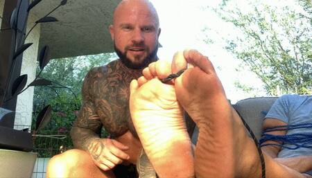 I tied up the tickler tied his toes together