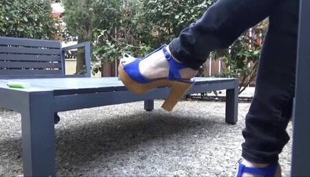 High heels dangling outdoors