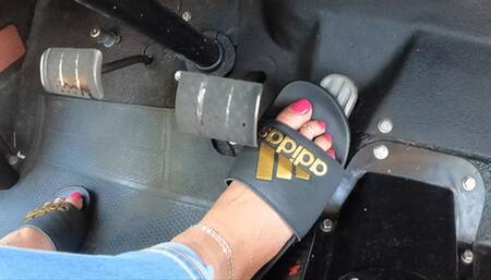 Driving the Jeep in Black Adidas Slides