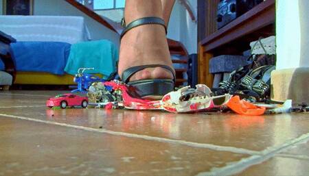Black clasic platform sandals on heels crushed motocycle and two little toy cars FULL HD (View from the second camera)