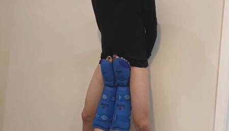 Lifting with kickboxing shin pads and kick balls