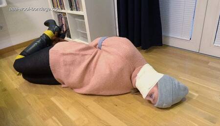 DINA HOGTIED IN A PINK SWEATER