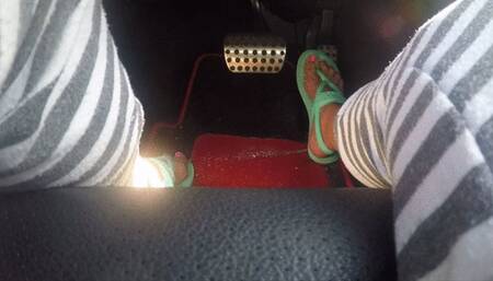 Strappy turquoise sandals behind the wheel PEDAL PUMPING