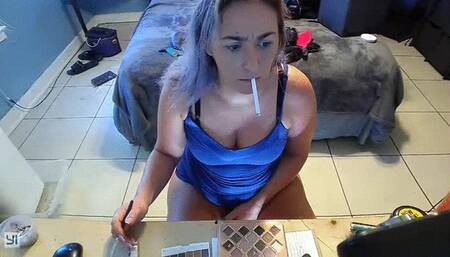 Chloe smokes and masturbates while putting makeup on