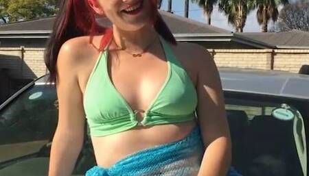 Pie model on the hood of a car