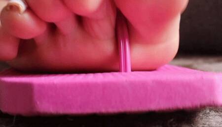 Dolce Amaran wiggling toes on pink flipflop for MOBILE DEVICES - FOOT - FEET- BBW - TOES - NAILS - FLIPFLOP - NEON - WIGGLING