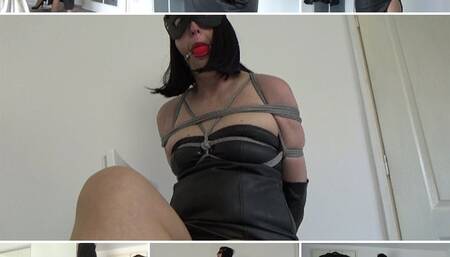 Glamour Lady tied up in leather evening gown