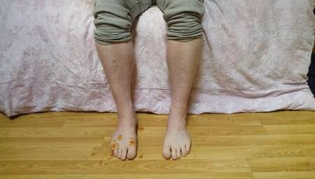 Pouring baked beans all over my clean feet