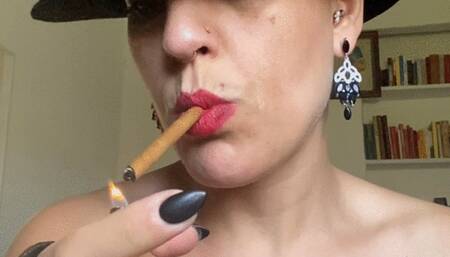 classy woman smoking a cigar