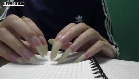 Nails scratching paper