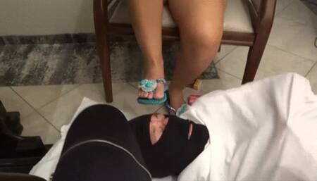 MAN UNDER TABLE SERVE US FOR LICKING OUR FEET AND SHOES