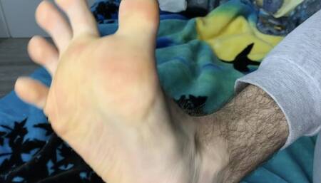 Boy 19 years old shows hairy feet