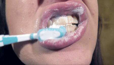 Brushing my teeth thoroughly and playing with mouth and lips