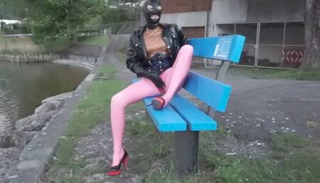 Pierced Latex Girl in Pink Leggings, Blouse,  Jacket, Demask  Corsett & Mask Gloves walks in the city with piercings rings hanging out & Masturbating Rubber Dildo PART II
