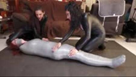 Laika mummified by the catsuit burglars!