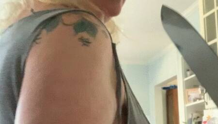 Bbw preps food with whale tail out in the kitchen