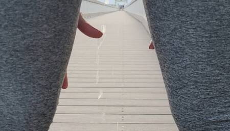 Lexi pees her leggings in a public park