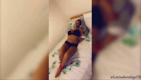 Latina in red leather cuffs hogtie and tape gagged (smaller size)