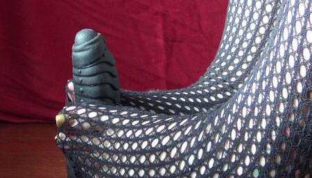 Fishnet footjob on dildo