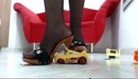 crushing 2 toycars with 3 sandals