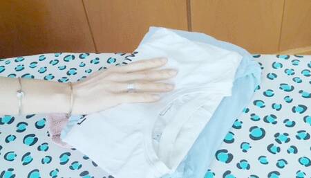 THE IRON SLIDES ON THE IRONING BOARD