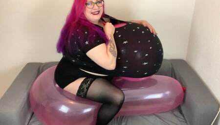 Balloon Stuffing sitting on a Longneck Balloon