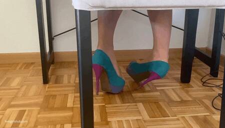 VERY SORE NYLON FEET IN HEEL HEELS RELAXING ON OFFICE DESK - MOV HD