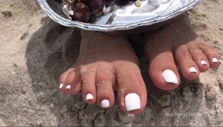 Marshmallow toenails in the sand_