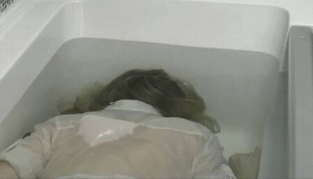 You are face down in bathtub where you try to go underwater and release a little air MP4 HD 720p