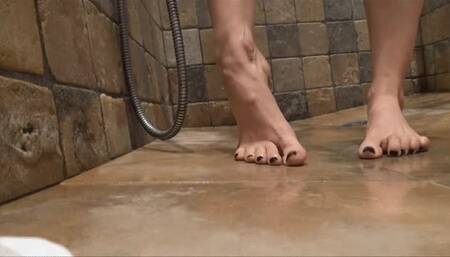 Cumshots on feet in the shower