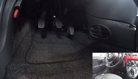 Ms Curious taking her white ballet flats on a joyride in the cute Fiat 500