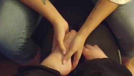 Disabled guy gets his crooked feet massaged