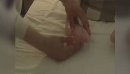 Cripple gets his crooked feet rubbed