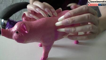 Am I finally going to make a hole in this toy rubber pig?