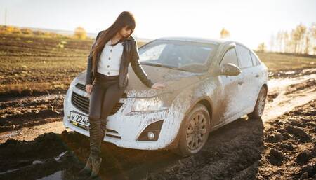 CAR STUCK  Maria stuck in the mud choosing the wrong path