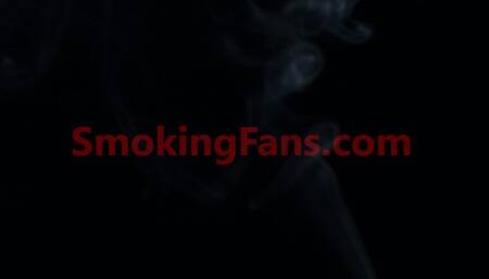 Chain smoking in fishnet tights and black dress