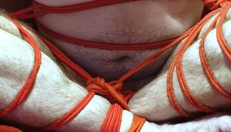 Cross-legged naked bound and gagged man 3