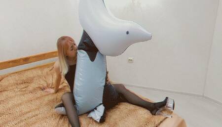 Alla inflates a big inflatable whale with her mouth and fucks him hot!!!