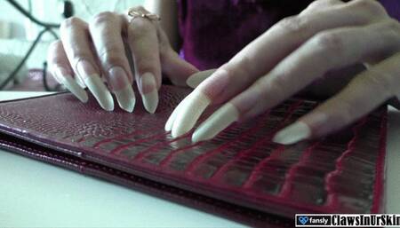 scratching my name signature on your wallet with my nails