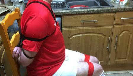 Footballer bound and gagged tight struggling on kitchen floor and made to cum