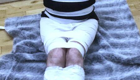 Taped up footballer on my kitchen floor. i finished him off with a nice post orgasm handjob.