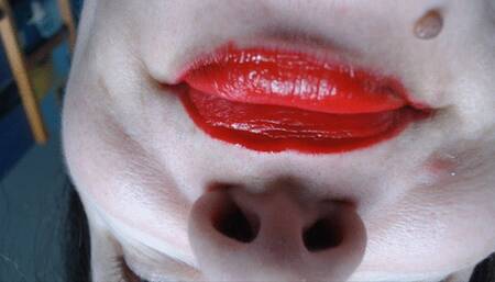 Inverted red lips are kissing you