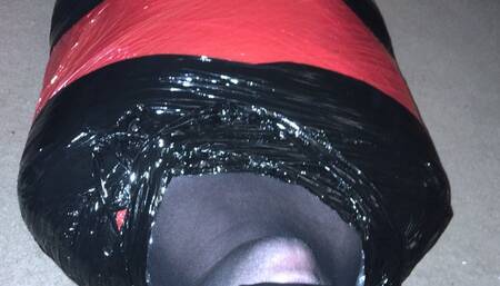 Mummified tight in pallet wrap escape challenge